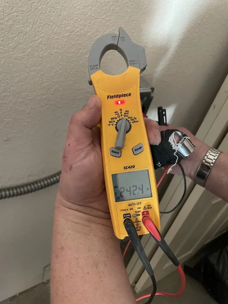 Voltage testing with clamp meter during Generator Installation in Keansburg